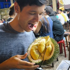Sean Lee eating Durian