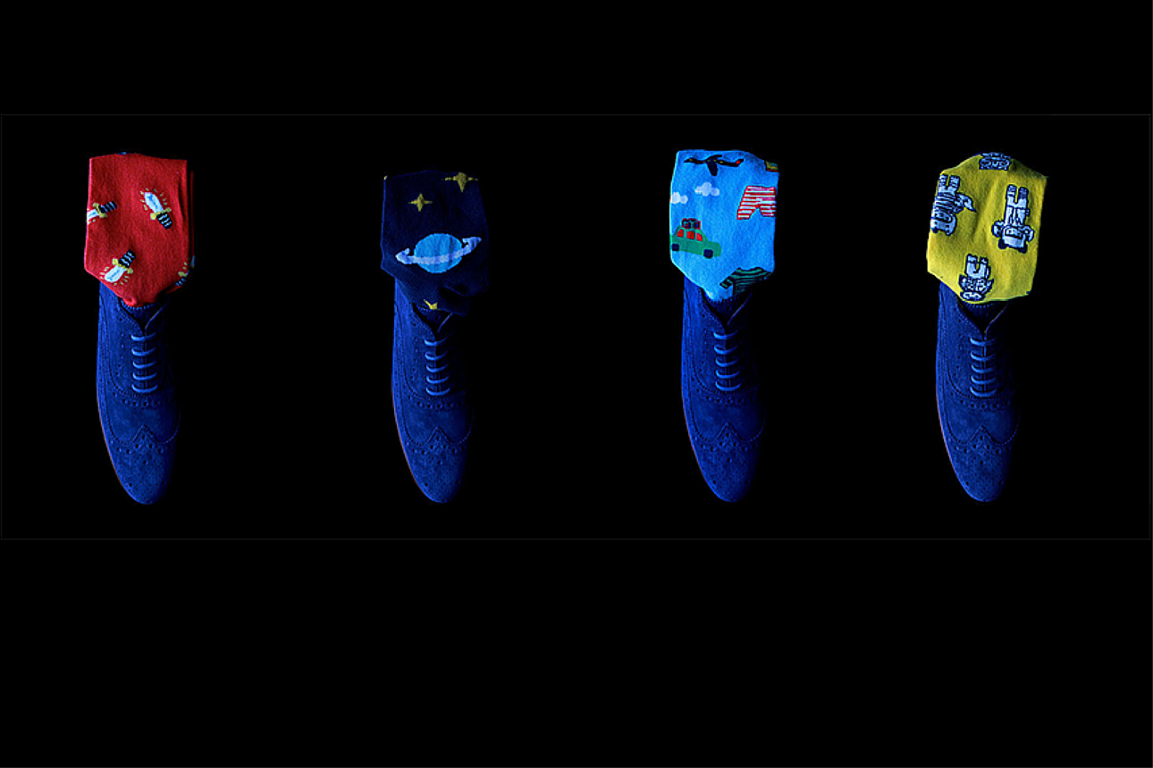 Bertrand's Proper Socks in Shoes on Black Background